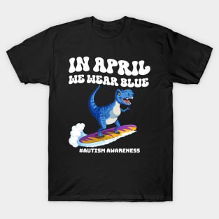 In April We Wear Blue Autism A Dinosaur On Surfboard Autism Awareness T-Shirt